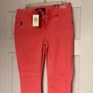 Torrid size 10R jeggings  in bright coral. Never worn